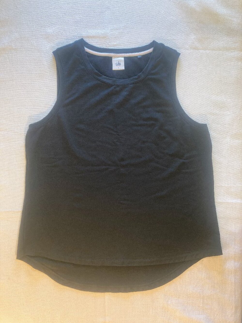 Cabi L black tank for layering or wearing as a sleeveless, mid-weight knit